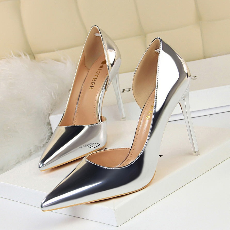 European and American style high heels simple stiletto metal heel high heel shallow mouth pointed side hollow sexy single shoes