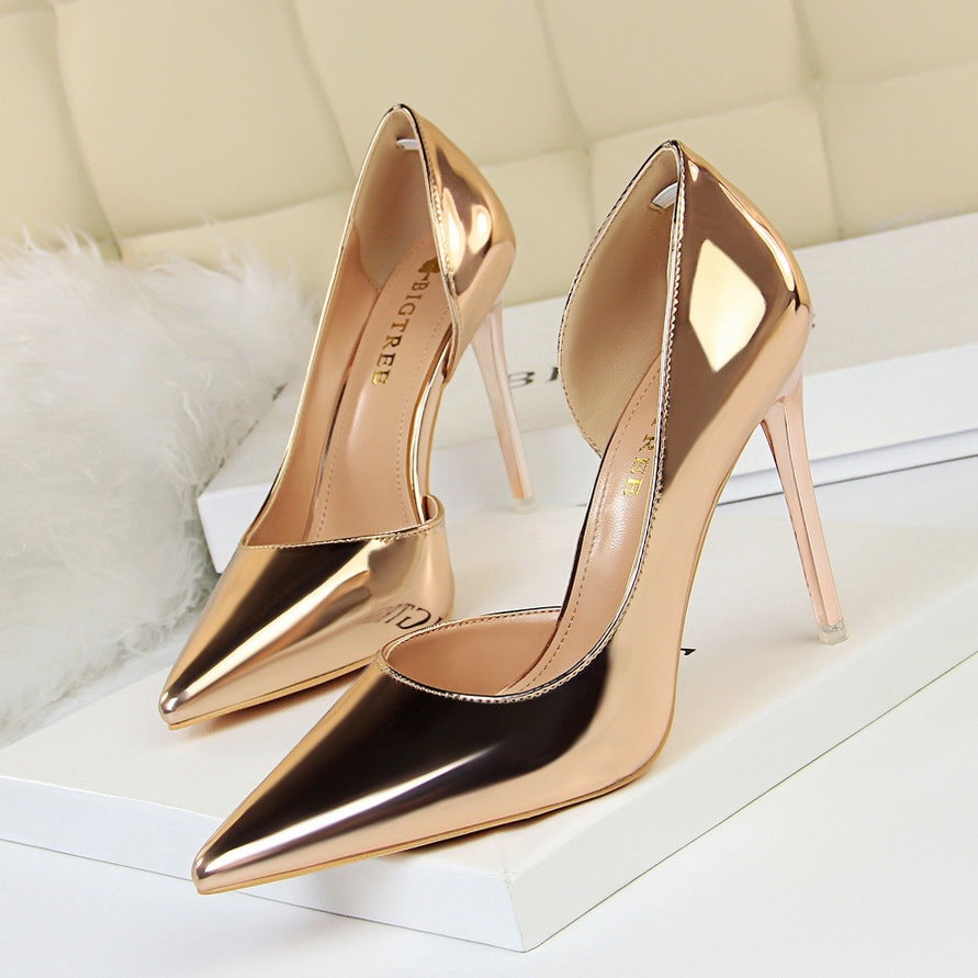 European and American style high heels simple stiletto metal heel high heel shallow mouth pointed side hollow sexy single shoes