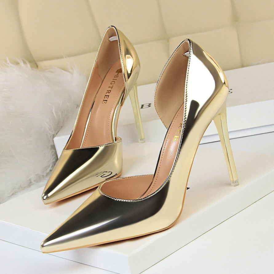 European and American style high heels simple stiletto metal heel high heel shallow mouth pointed side hollow sexy single shoes