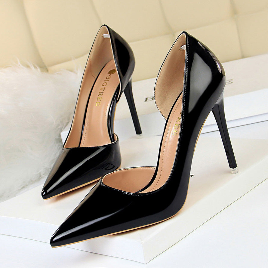 European and American style high heels simple stiletto metal heel high heel shallow mouth pointed side hollow sexy single shoes