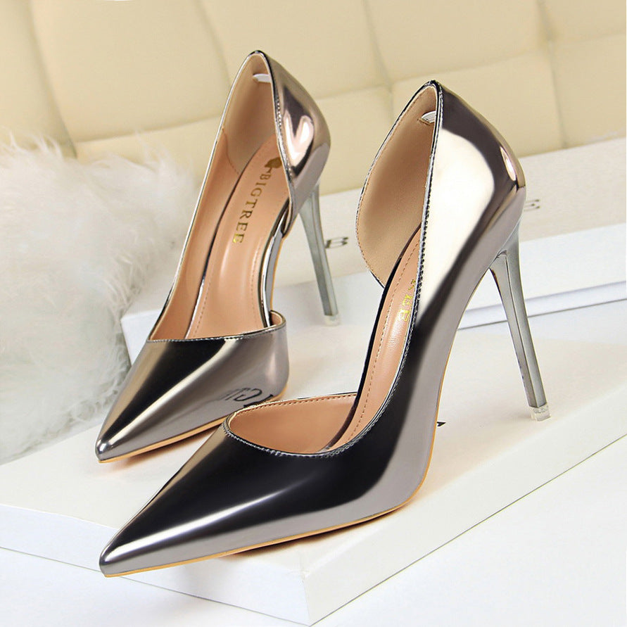 European and American style high heels simple stiletto metal heel high heel shallow mouth pointed side hollow sexy single shoes